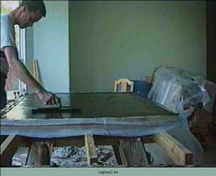 Tamping and smoothing concrete countertop