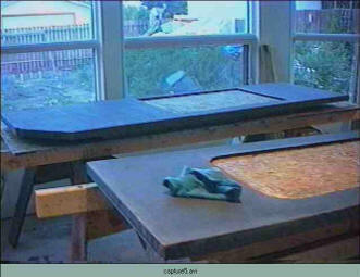 Concrete countertop drying on frames