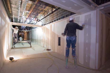 Drywall installers at the Capital Visitors Center on the Natural Handyman home repair and do it yourself website