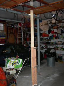 Support for garage door panels on the Natural Handyman home repair and do it yourself website