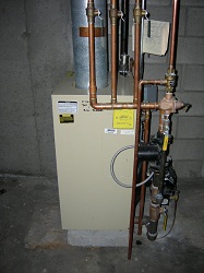Furnace for area heating and hot water